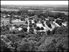 This is a black and white photo aerial shot of Sunderland, Massachusetts at the top of Cliffside Mountain.