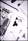 This is a black and white close-up photo of a deck of playing cards.