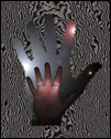 This is a digital image created of my hand, and a cut-out of my hand in the background, with light shining through.