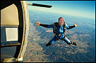 This is a super-imposed photo of my dad jumping out of a plane skydiving.