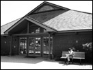 This is a black and white photo in front of the UMass Student Center.